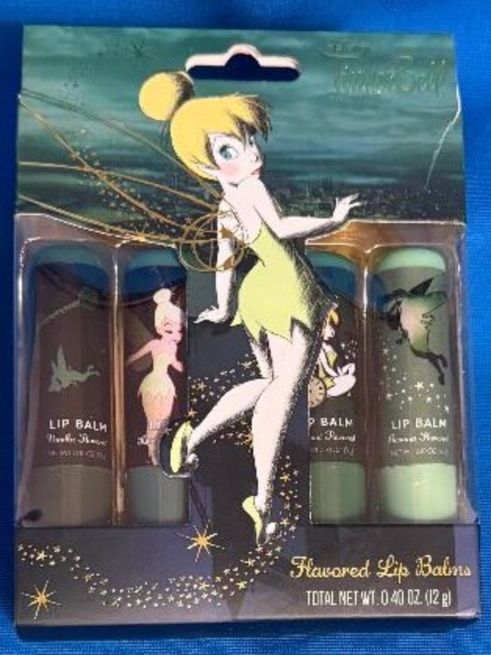 DISNEY TINKER BELL 4 PACK FLAVORED LIP BALMS VANILLA BANANA COCONUT & KIWI MELON